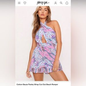 Nasty Gal brand wrap romper. Never worn still in package. Bought L needed M